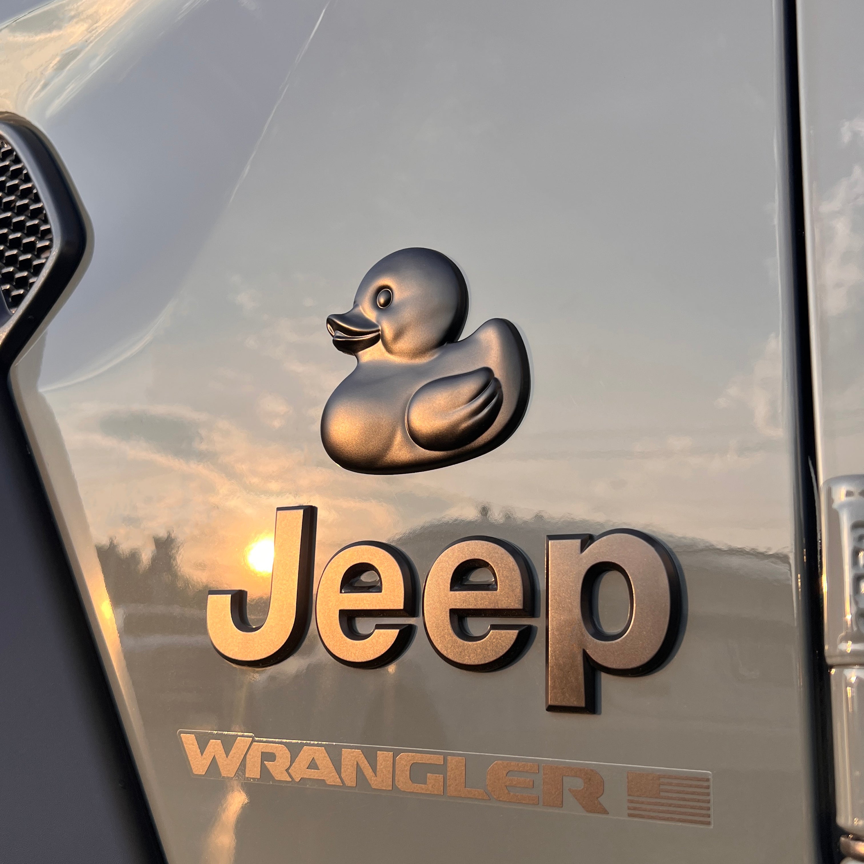 Matte Chrome rubber duck car badge – durable ABS plastic with 3M adhesive, safe for vehicle paint. Weather-resistant emblem fits Jeep, laptop, cooler, or any flat surface. Chrome decal for outdoor and automotive use.