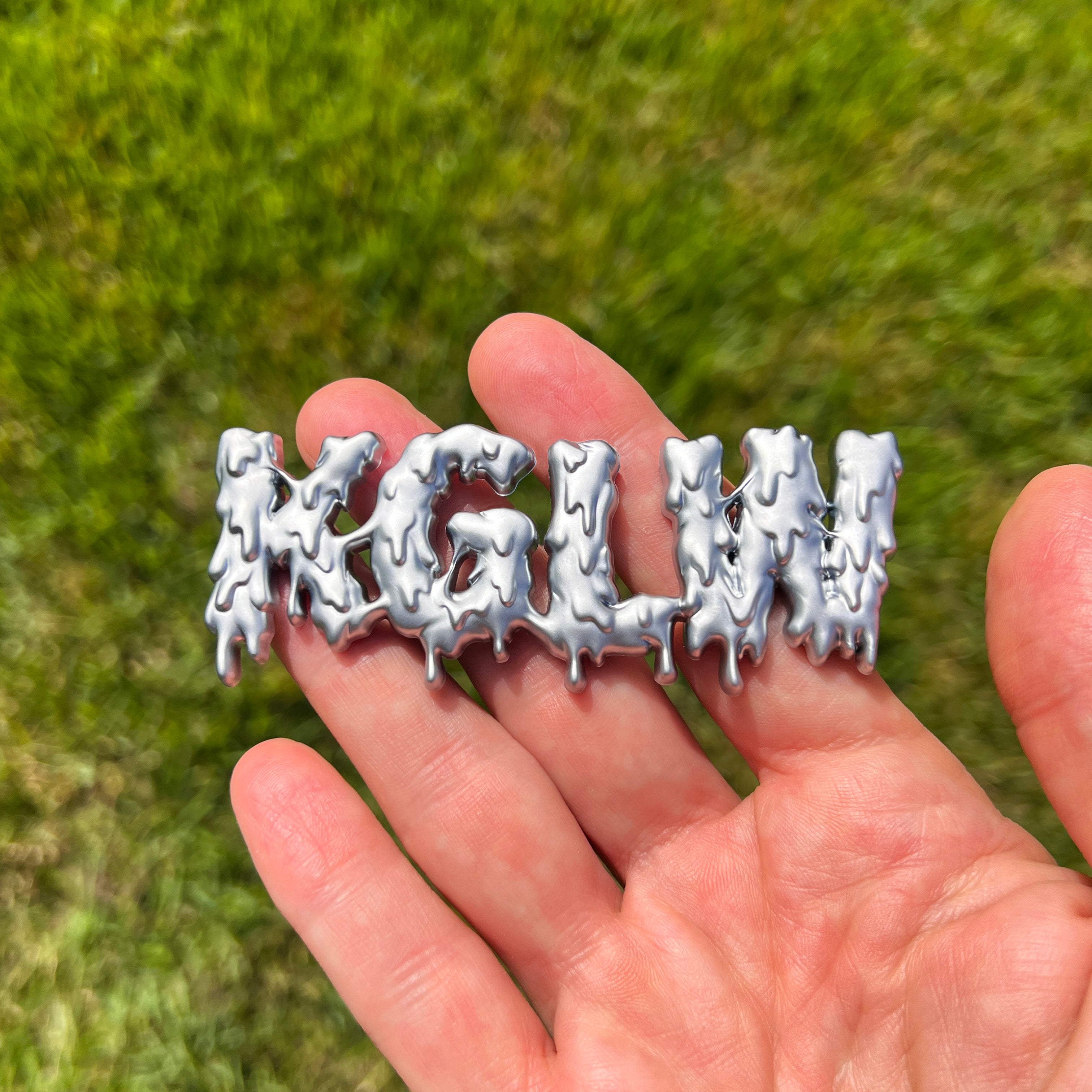 the DRIP DRIP KGLW BADGE