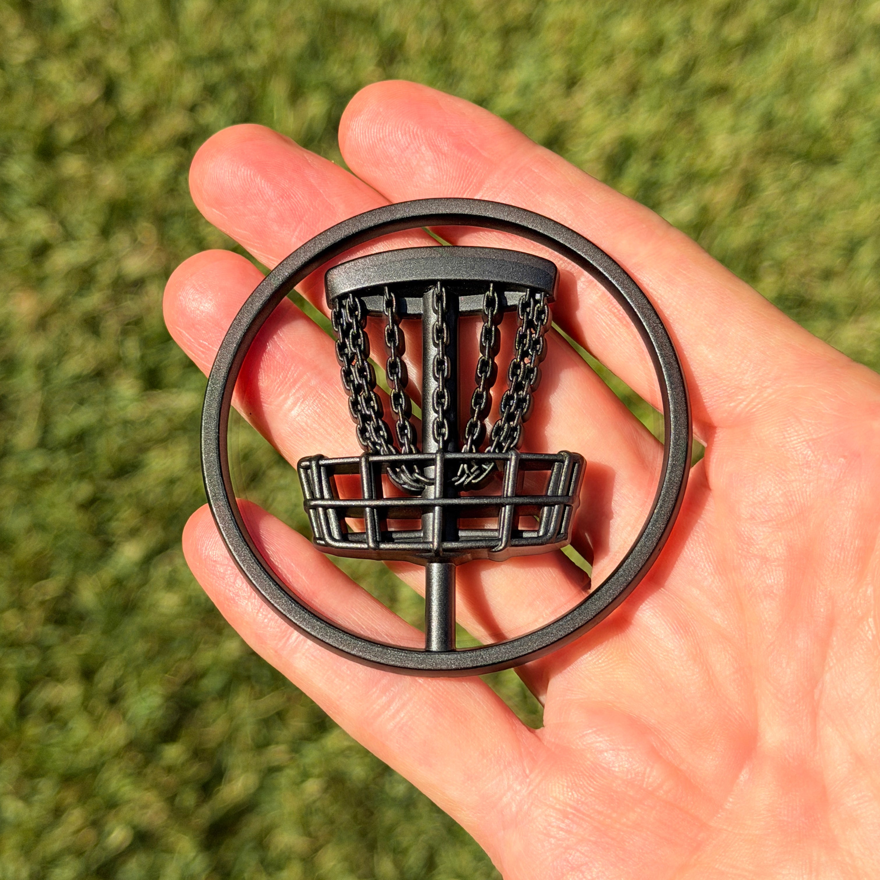 the MATTE BLACK DISC GOLF BADGE