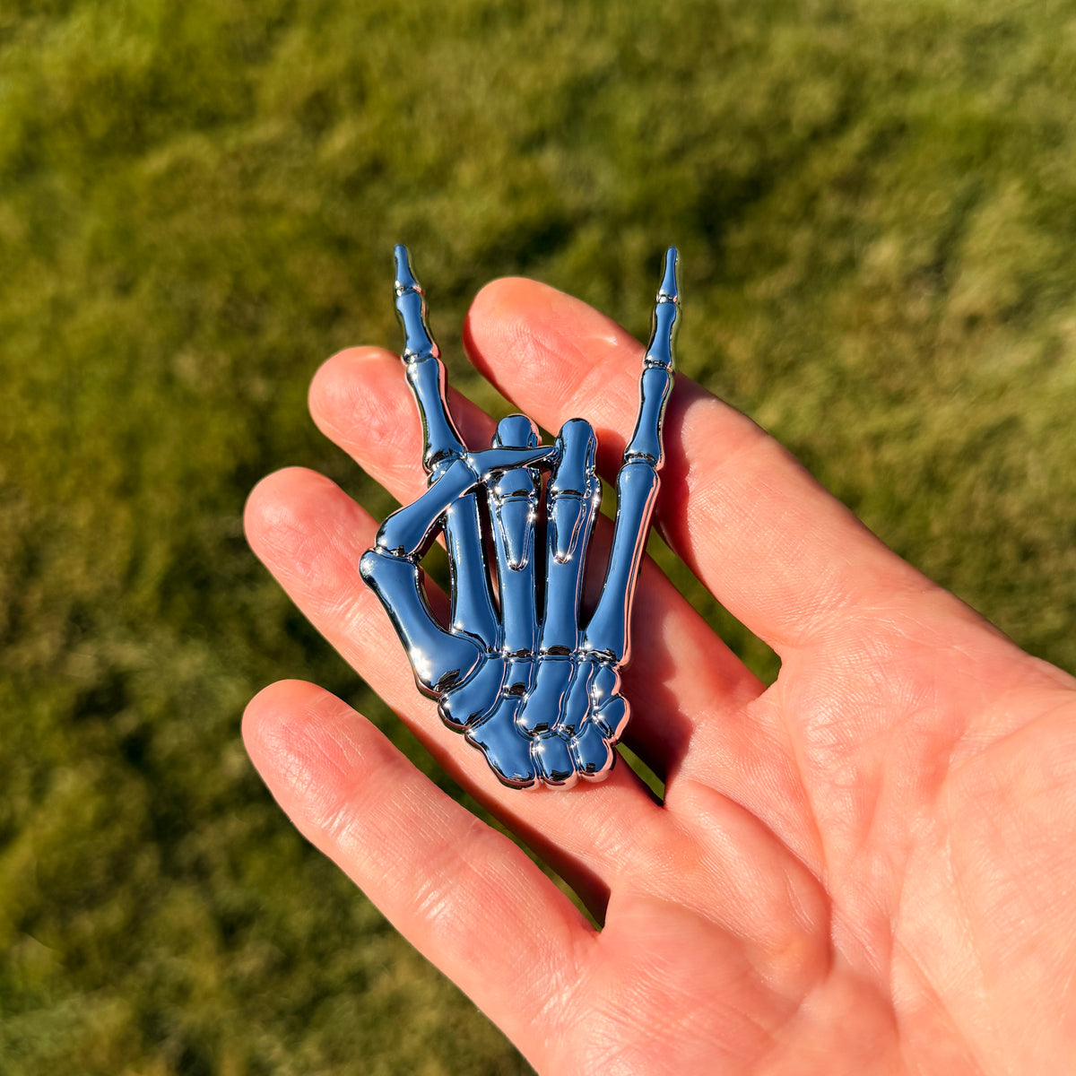 the SKELETON METAL HORNS BADGE - Grateful Fred -