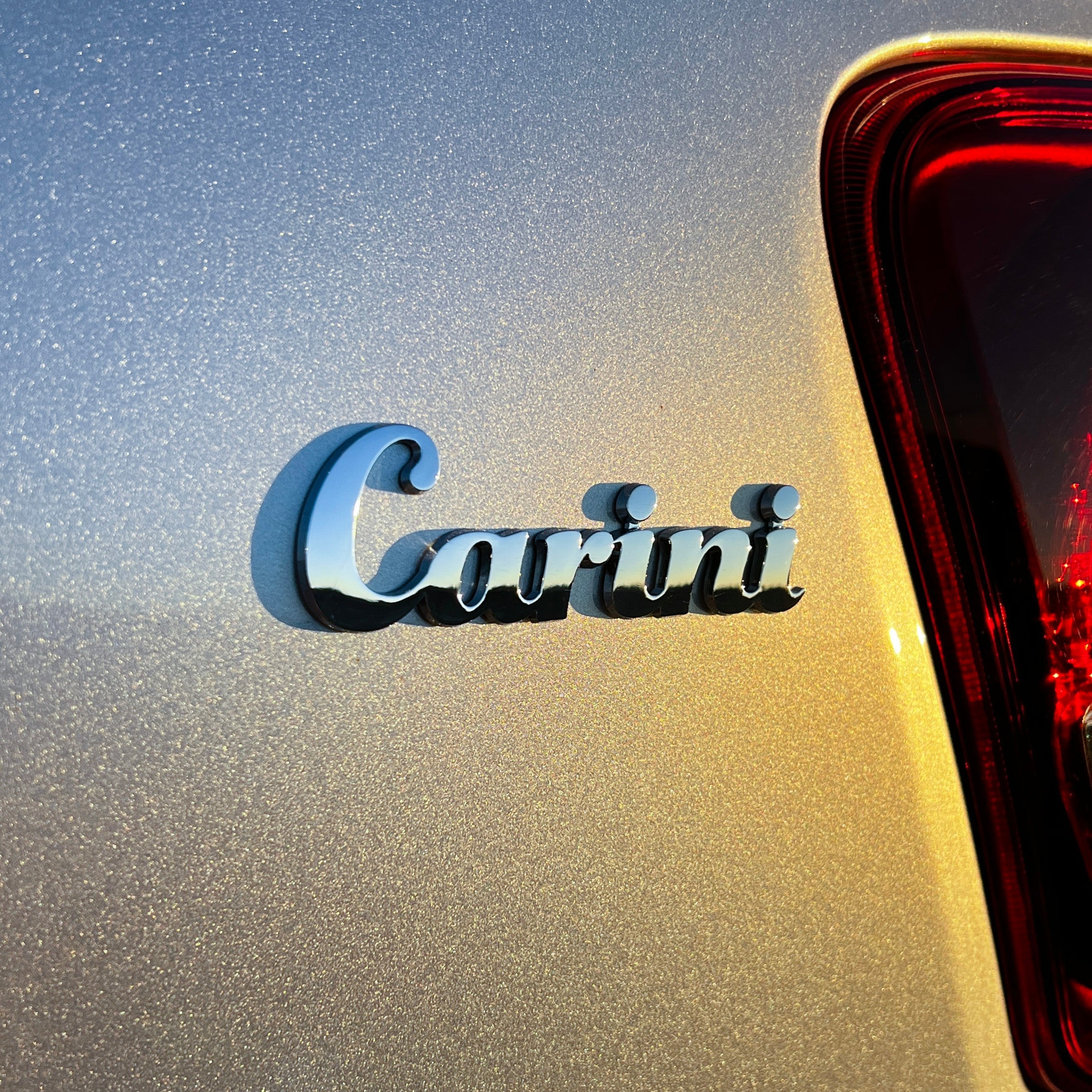 the CARINI BADGE - Grateful Fred - Vehicle Emblems & Hood Ornaments