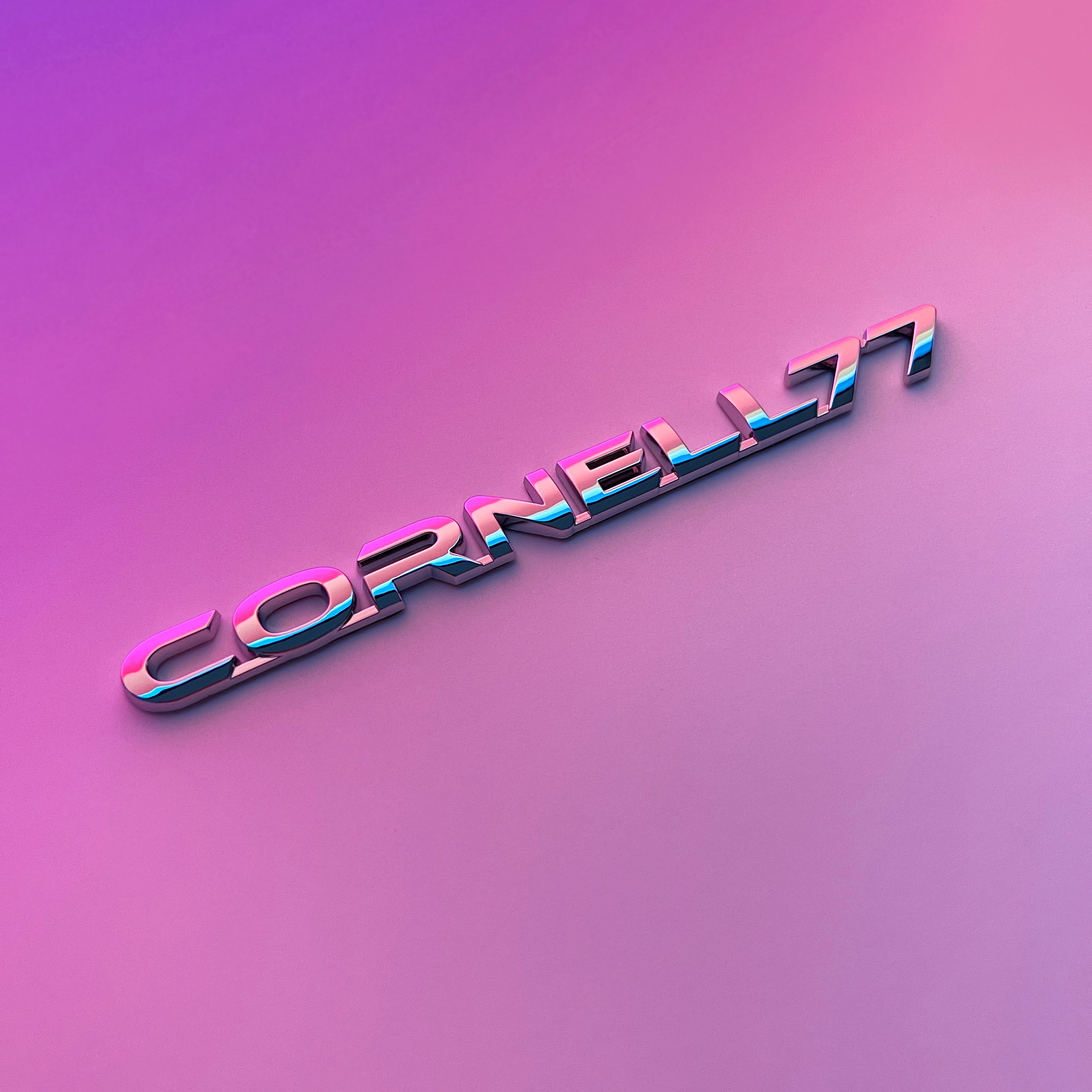 the CORNELL 77 BADGE - Grateful Fred - Vehicle Emblems & Hood Ornaments