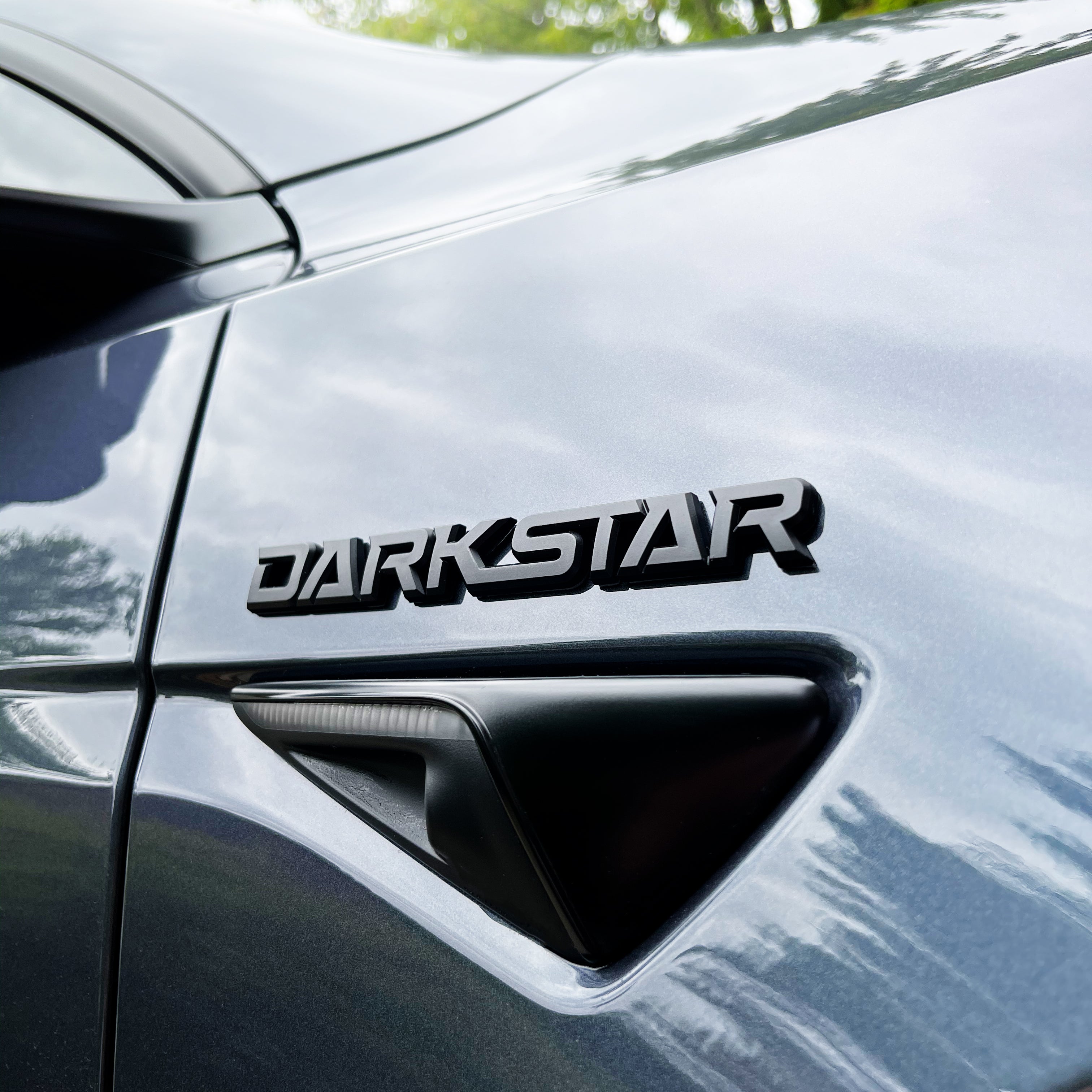 the DARK STAR BADGE - Grateful Fred - Vehicle Emblems & Hood Ornaments