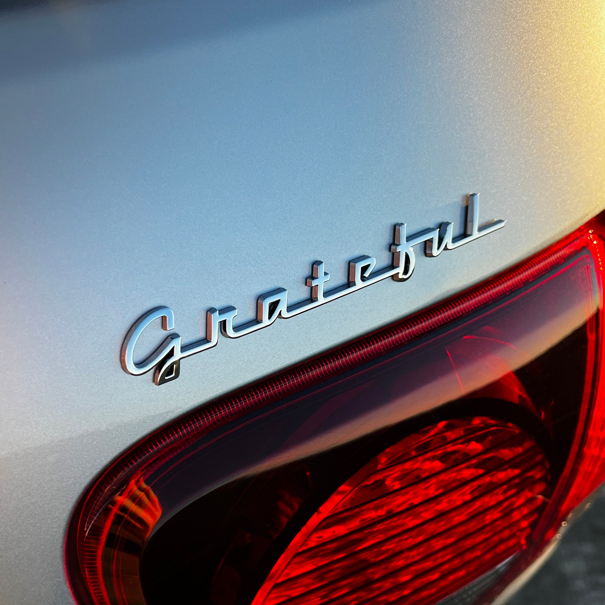 the GRATEFUL BADGE - Grateful Fred - Vehicle Emblems & Hood Ornaments