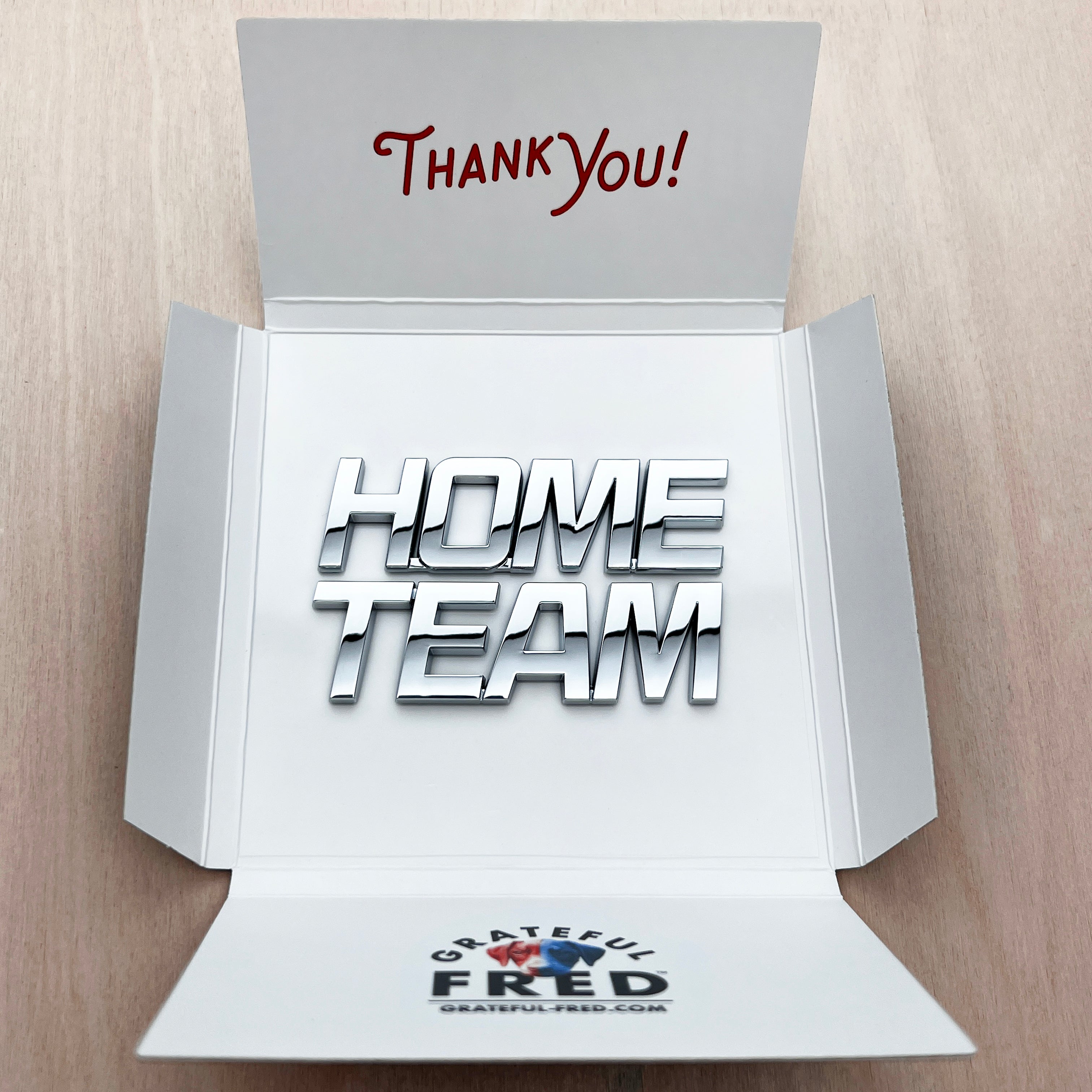 the HOME TEAM BADGE - Grateful Fred - Vehicle Emblems & Hood Ornaments