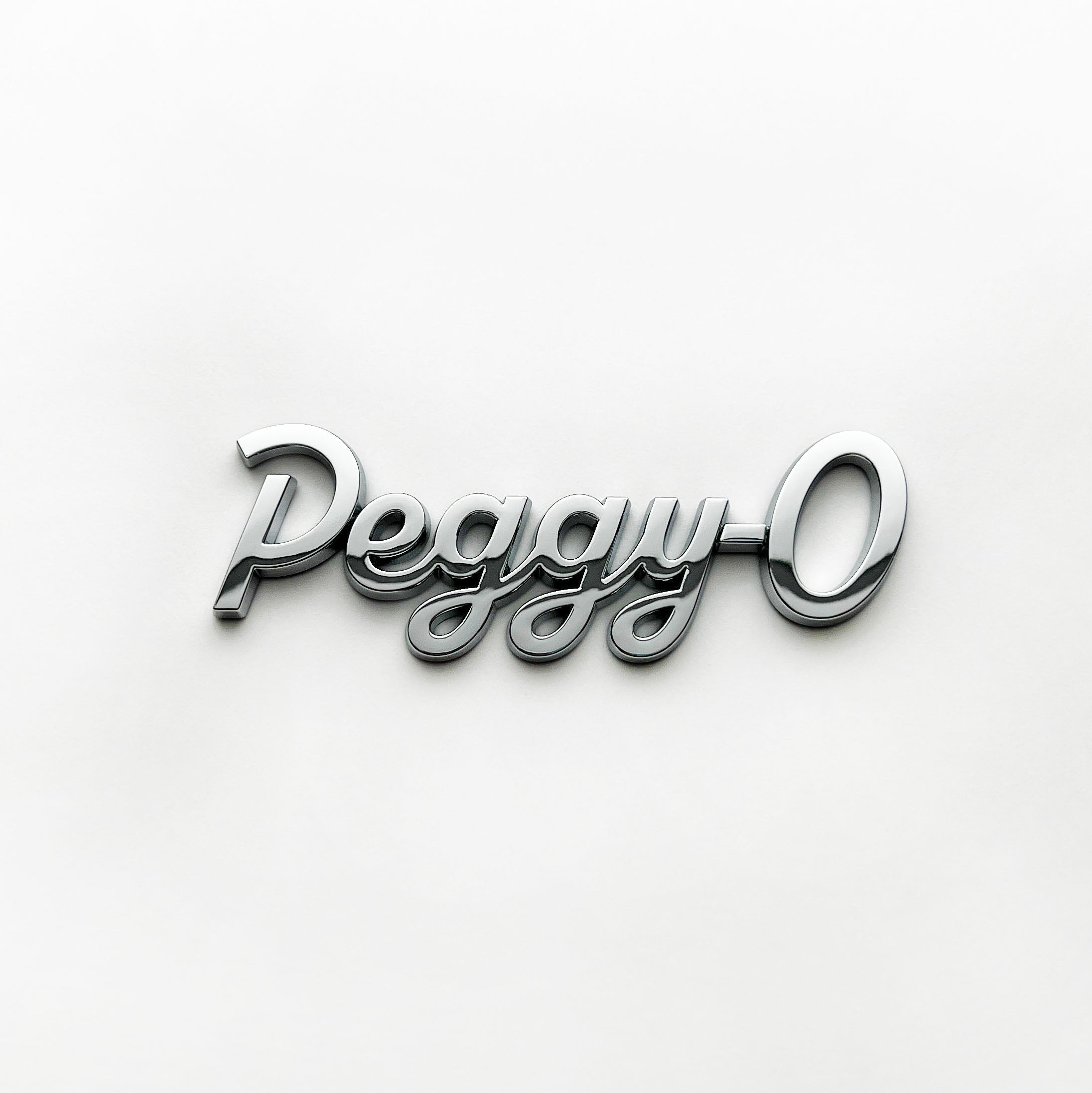 the PEGGY-O BADGE - Grateful Fred - Vehicle Emblems & Hood Ornaments