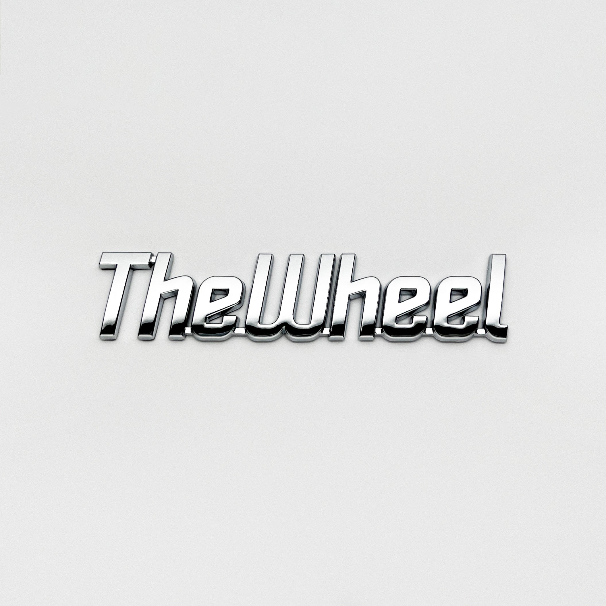 the WHEEL BADGE - Grateful Fred - Vehicle Emblems & Hood Ornaments