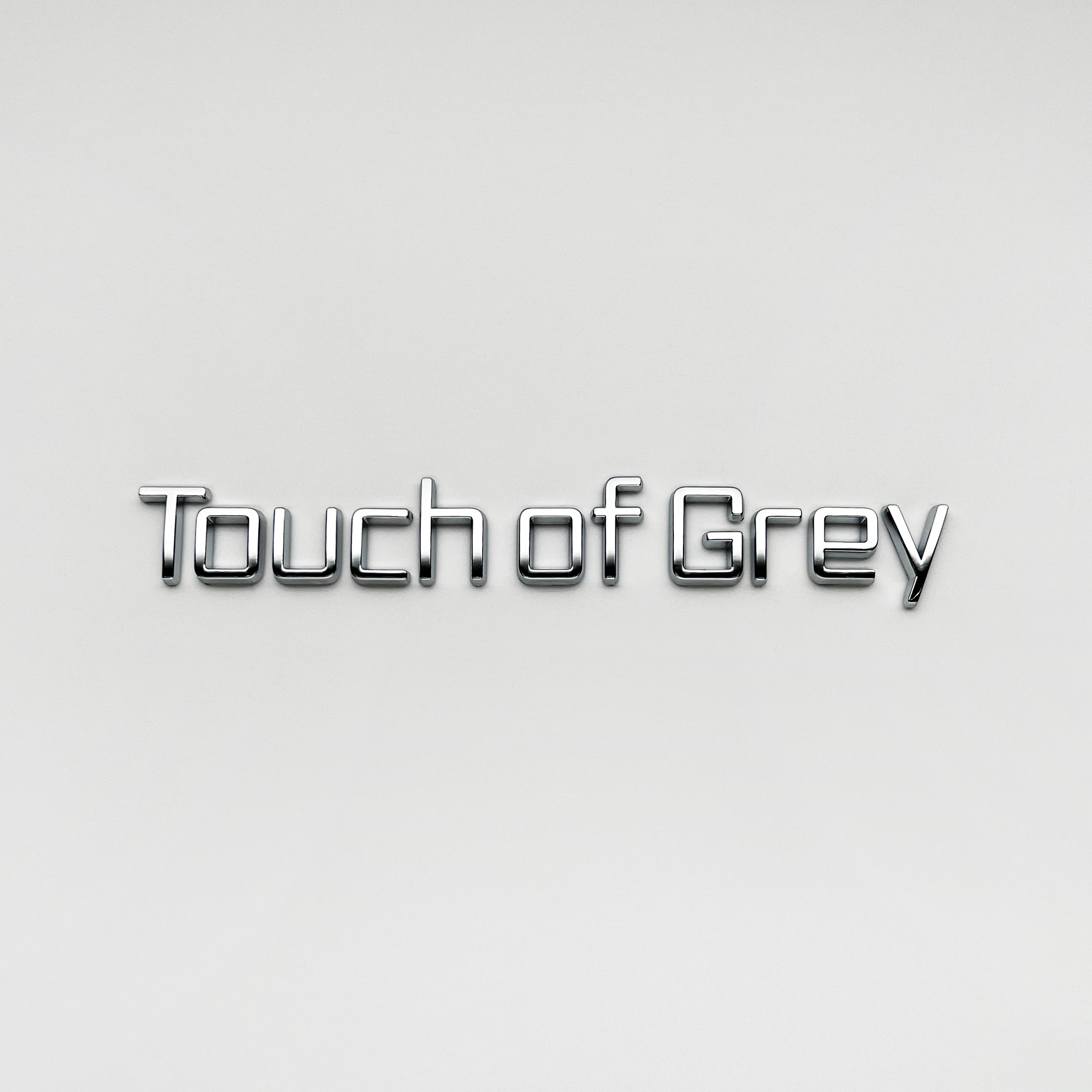 the TOUCH OF GREY BADGE - Grateful Fred   - Vehicle Emblems & Hood Ornaments