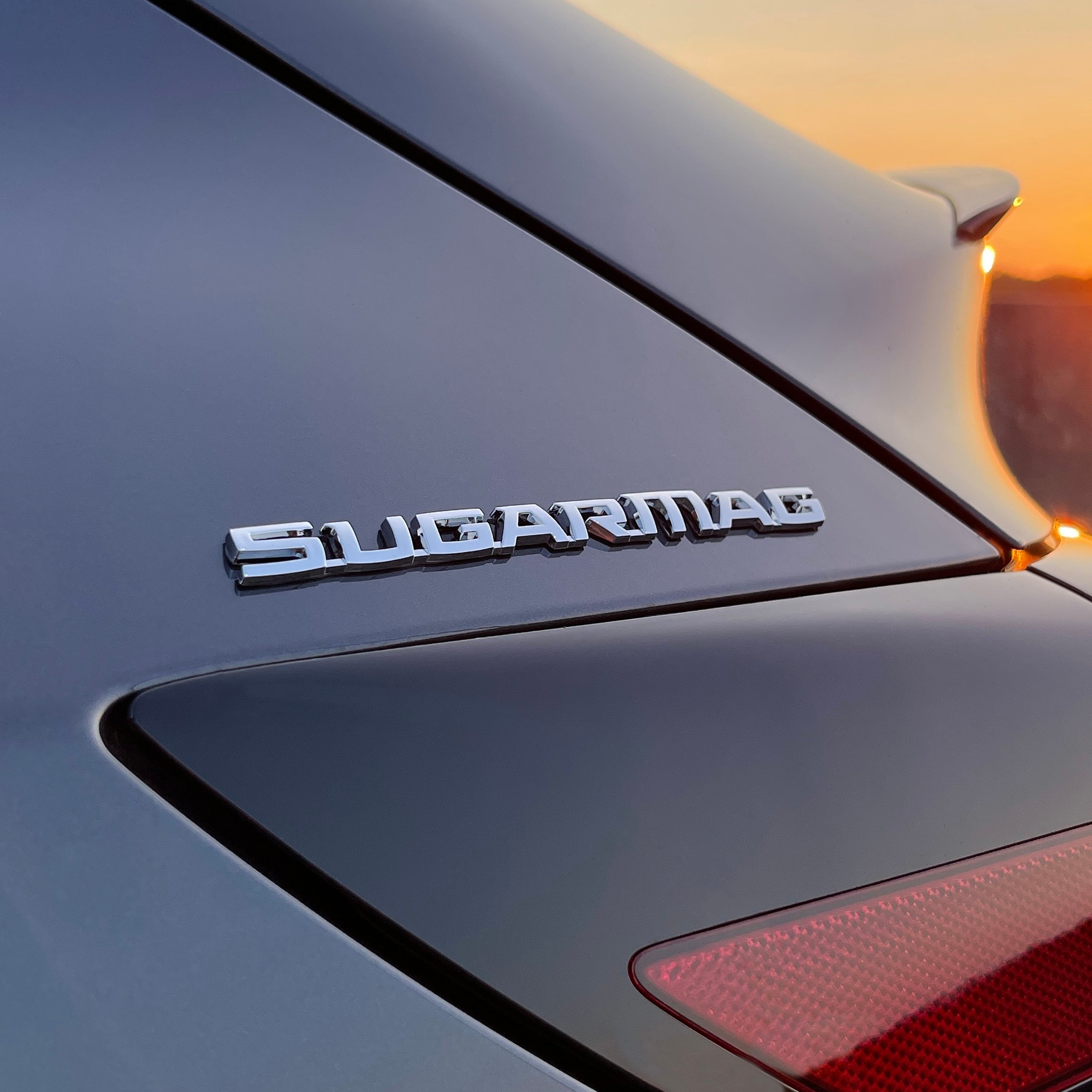 the SUGAR MAG BADGE - Grateful Fred - Vehicle Emblems & Hood Ornaments