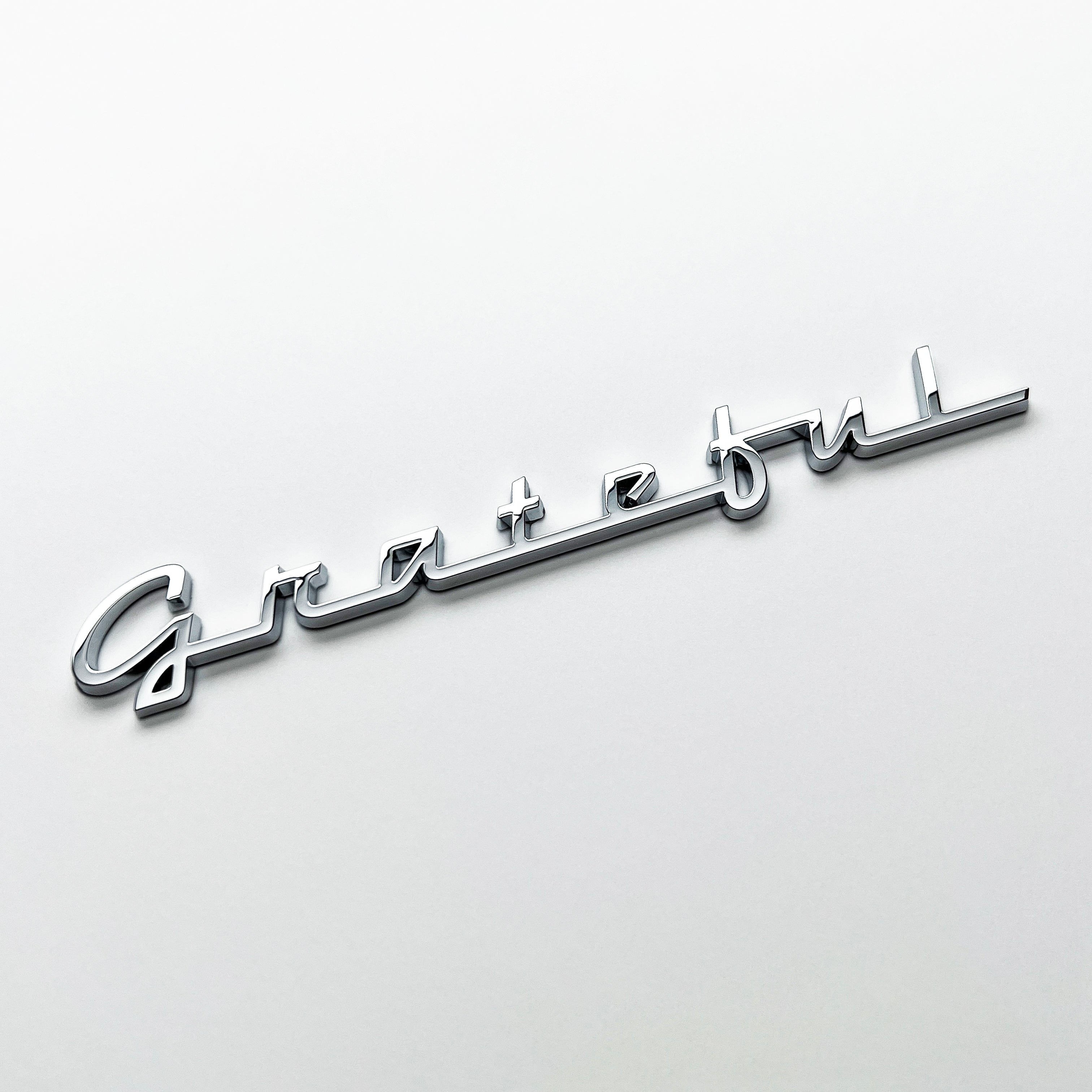 the GRATEFUL BADGE - Grateful Fred - Vehicle Emblems & Hood Ornaments