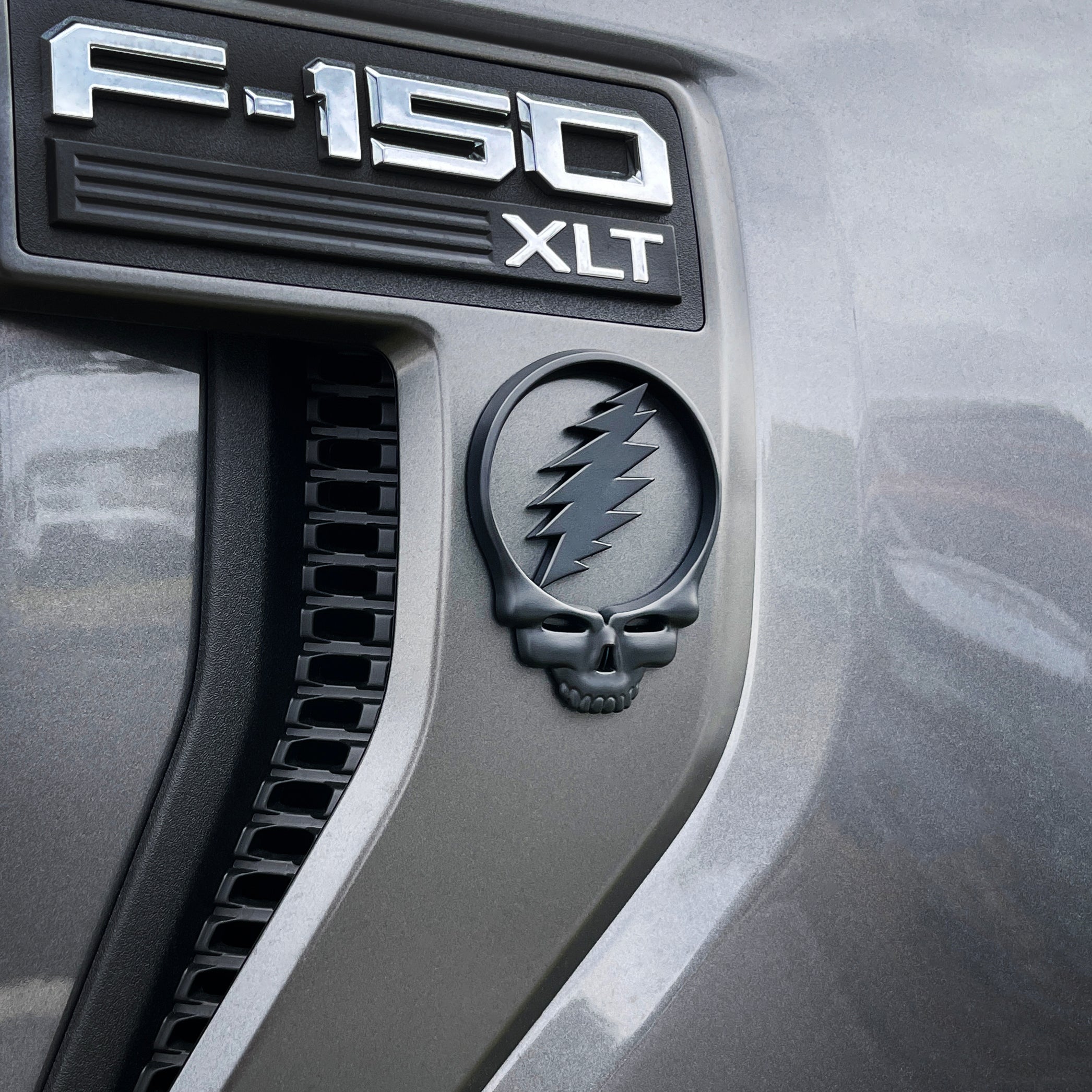 the STEAL YOUR FACE BADGE - Grateful Fred - Vehicle Emblems & Hood Ornaments