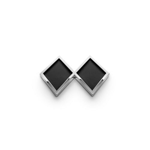 the DOUBLE BLACK DIAMOND BADGE