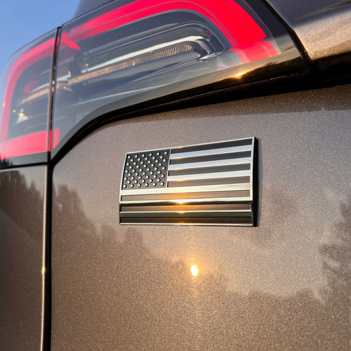 the AMERICAN FLAG BADGE