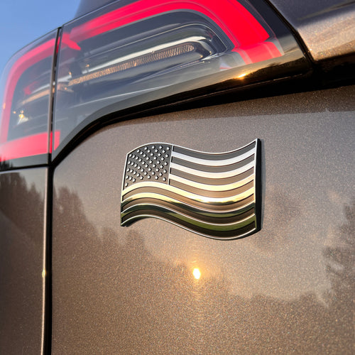 the WAVY AMERICAN FLAG BADGE