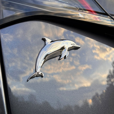 the DOLPHIN BADGE