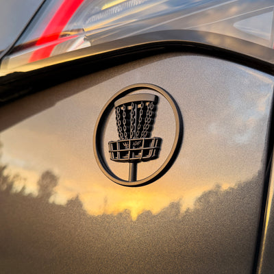 the MATTE BLACK DISC GOLF BADGE
