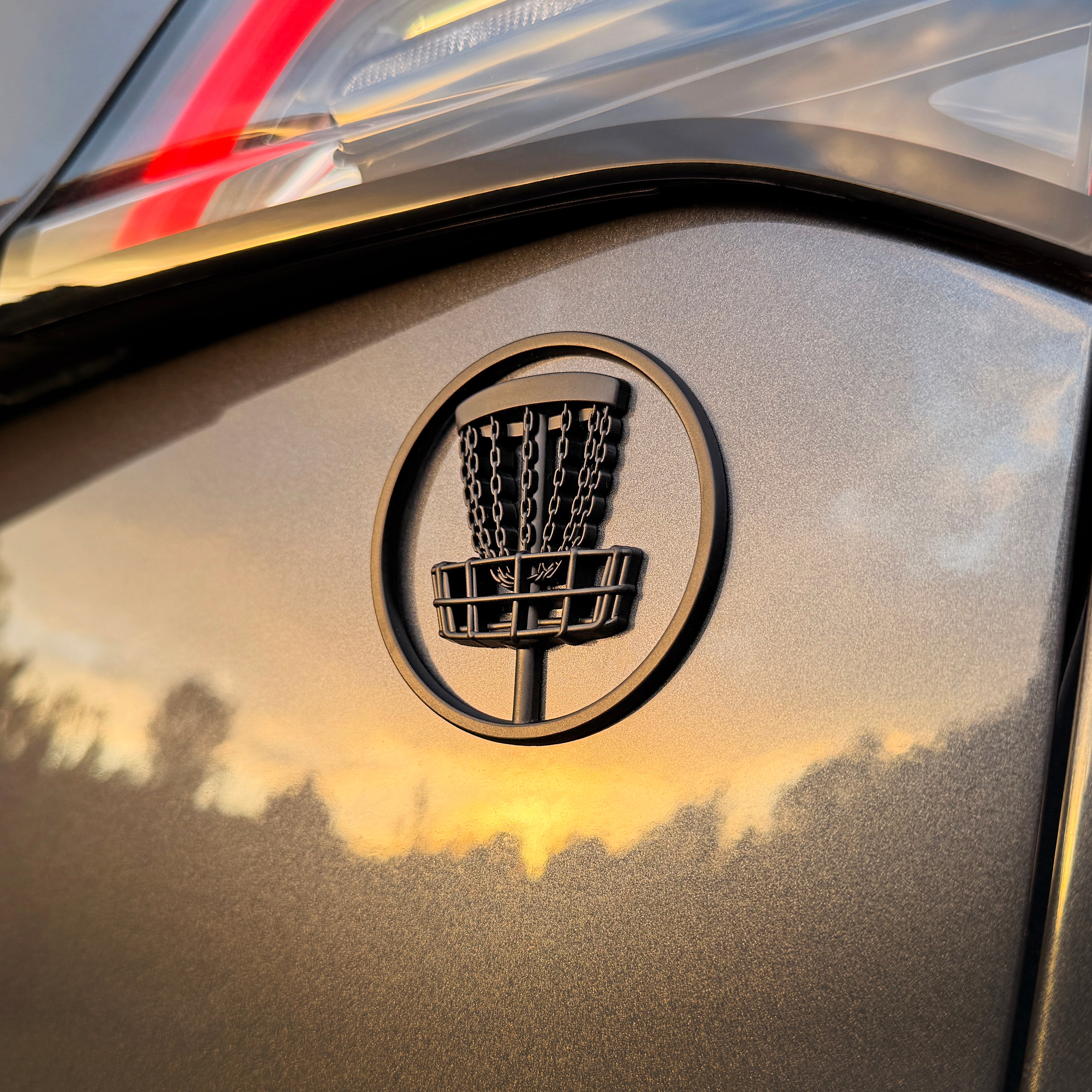 the MATTE BLACK DISC GOLF BADGE