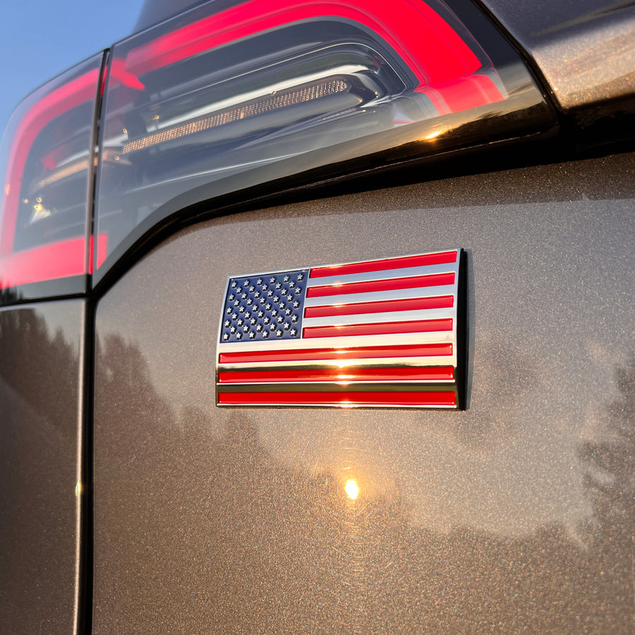 The AMERICAN FLAG BADGE on a truck