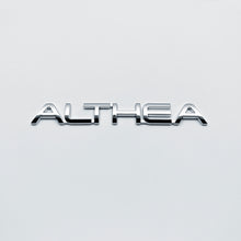 Load image into Gallery viewer, the ALTHEA BADGE - Grateful Fred   - Vehicle Emblems &amp; Hood Ornaments
