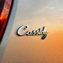 Load image into Gallery viewer, the CASSIDY BADGE - Grateful Fred   - Vehicle Emblems &amp; Hood Ornaments
