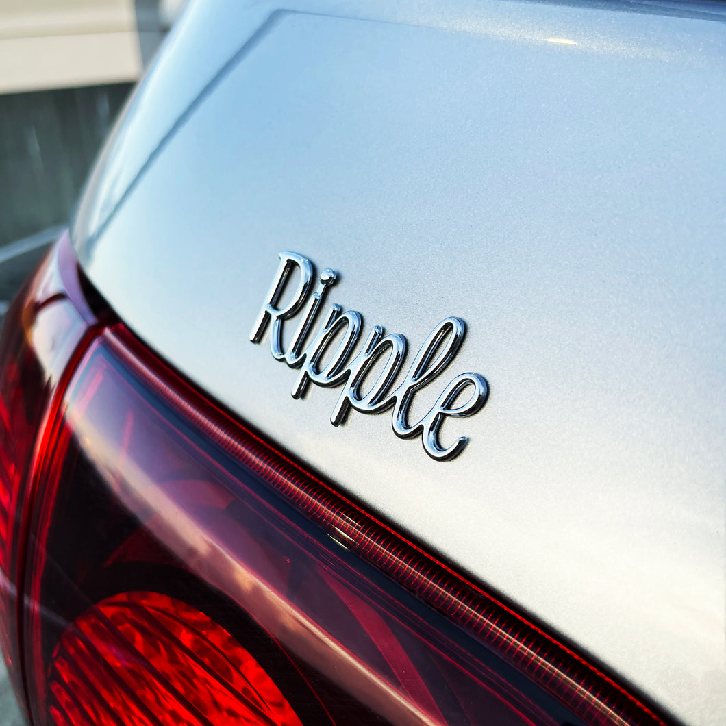 the RIPPLE BADGE - Grateful Fred   - Vehicle Emblems & Hood Ornaments