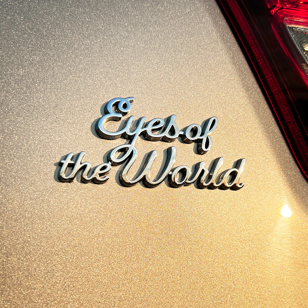 the EYES OF THE WORLD BADGE - Grateful Fred   - Vehicle Emblems & Hood Ornaments