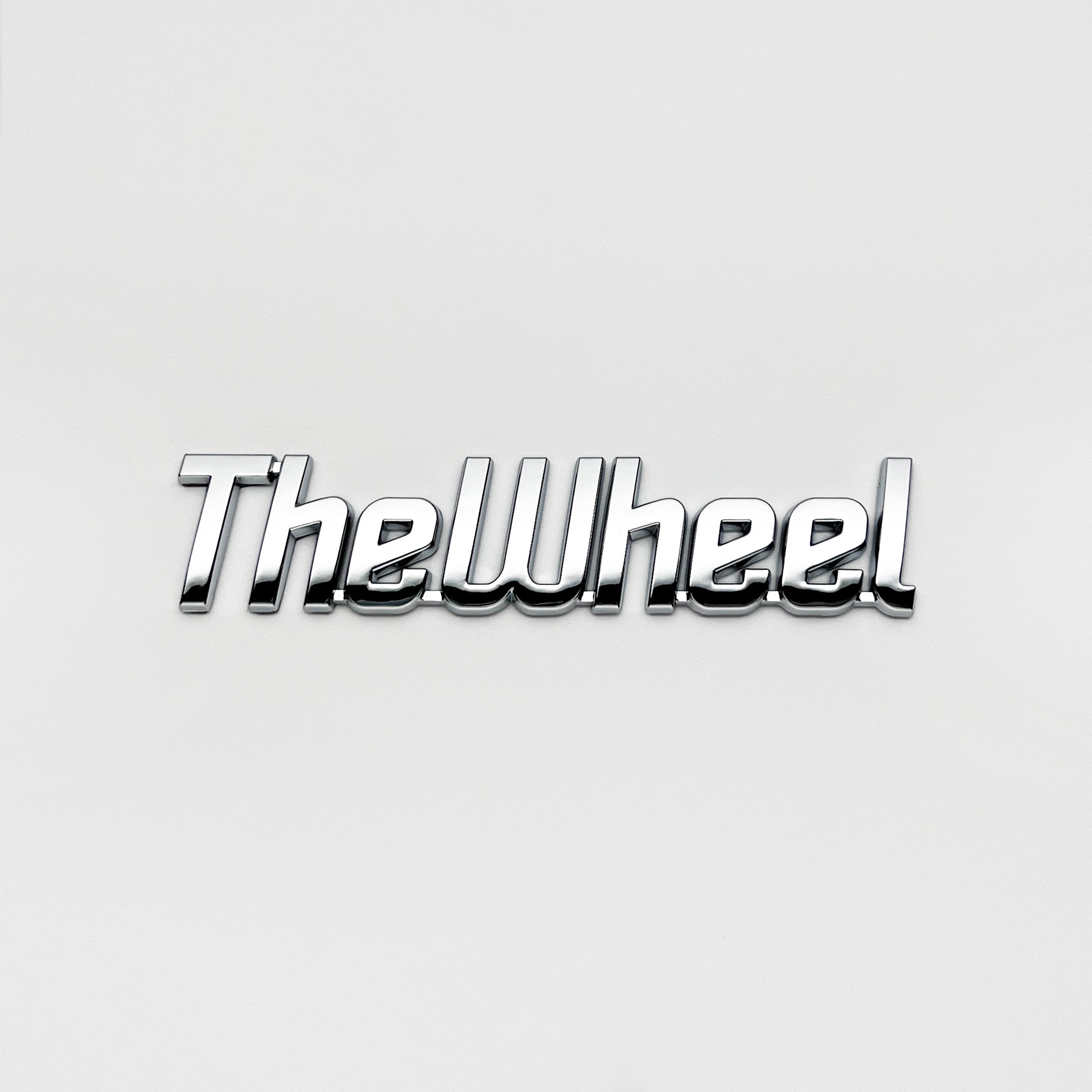 the WHEEL BADGE - Grateful Fred   - Vehicle Emblems & Hood Ornaments