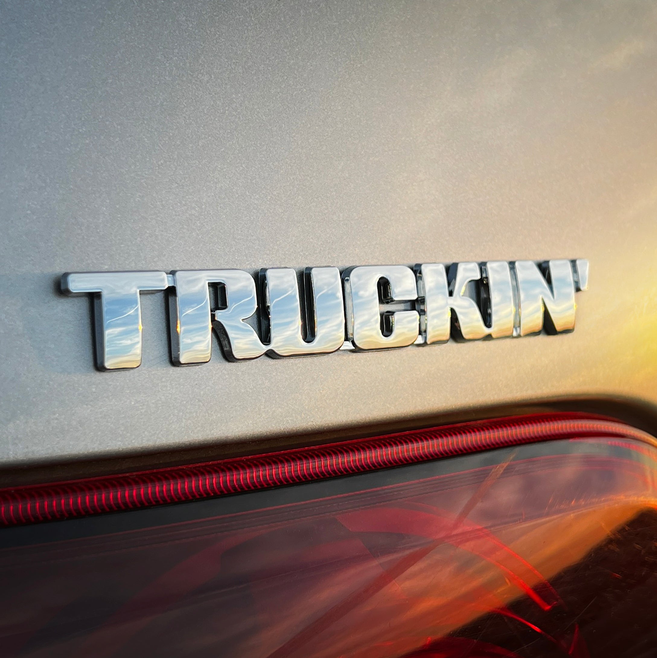 the TRUCKIN' BADGE - Grateful Fred   - Vehicle Emblems & Hood Ornaments