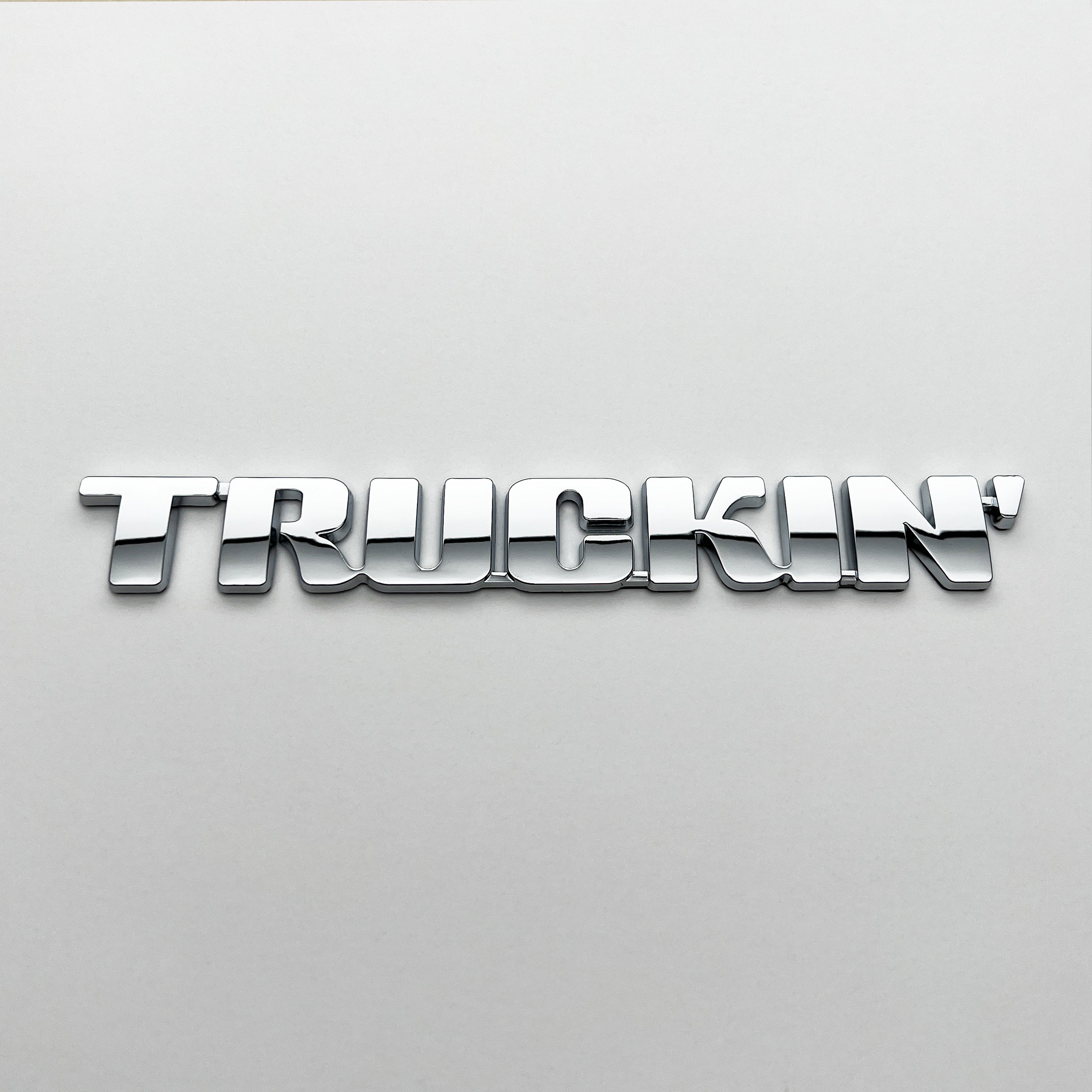 the TRUCKIN' BADGE - Grateful Fred   - Vehicle Emblems & Hood Ornaments