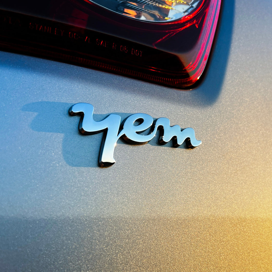 the YEM BADGE - Grateful Fred   - Vehicle Emblems & Hood Ornaments